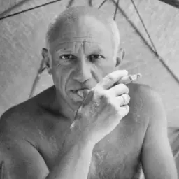 Sörjande män bär en blomsterkrans med texten "Málaga" och "Pablo". Kanske en hyllning till hur dog Pablo Picasso?