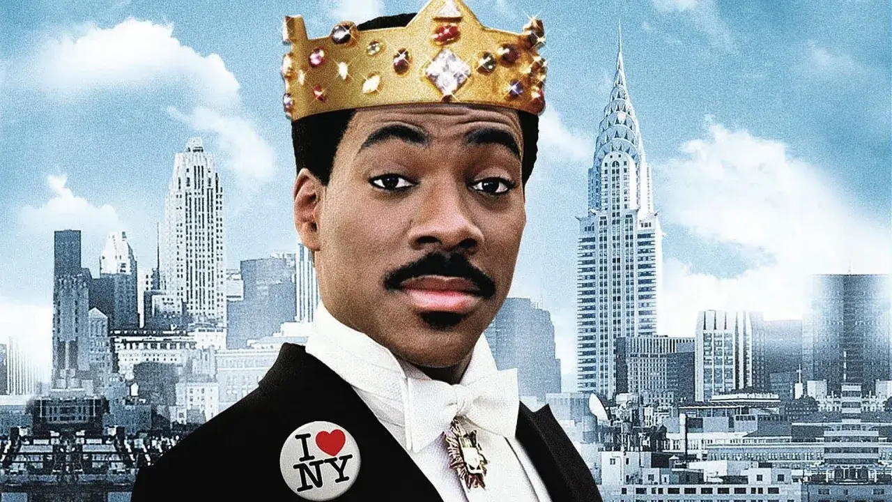 Eddie Murphy som en prins i New York, med krona och "I Love NY"-knapp.