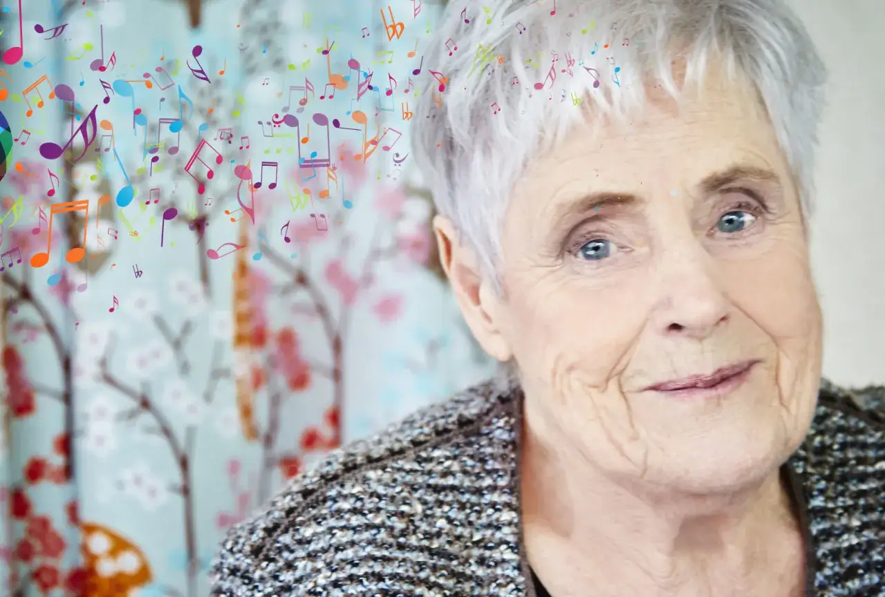 Elsie Johansson, den riktiga Elsie, omgiven av glada musiknoter som svävar runt hennes huvud.