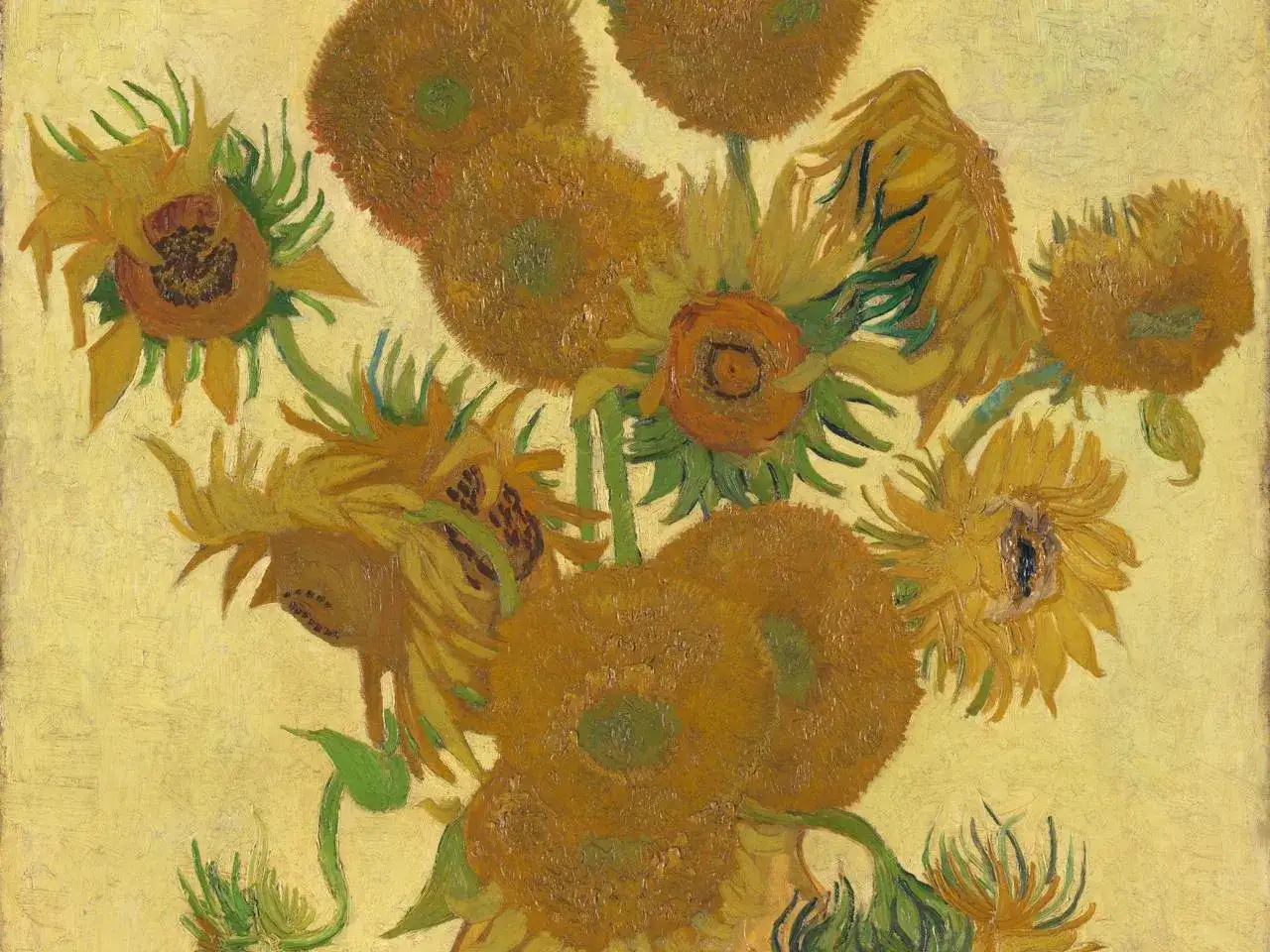 En bukett av Van Goghs solrosor i olika stadier av blomning, med tjocka penseldrag och varma gula toner mot en ljusgul bakgrund.